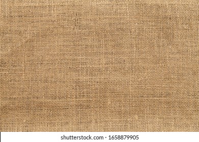 old brown grainy cotton cloth texture background 