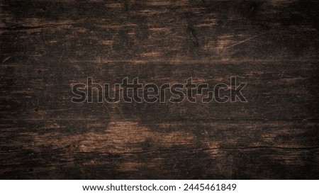 Old brown rustic dark grunge grain wooden timber hardwood wall or floor or table texture - wood background banner with vignette	