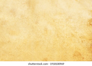 Old brown yellow paper grunge background. Abstract liquid coffee color texture.