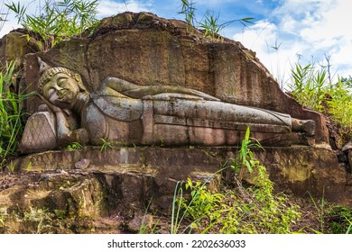 The Old Buddha Carved On Big Boulder In Laos.