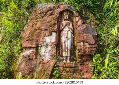 The Old Buddha Carved On Big Boulder In Laos.