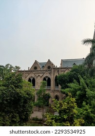 An old building between trees