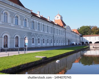 The old building in front has a pool.