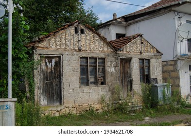 Old Building Houses In The Village Square