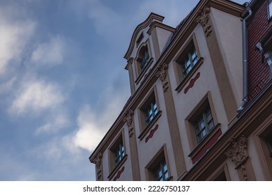 old building with sky and clouds