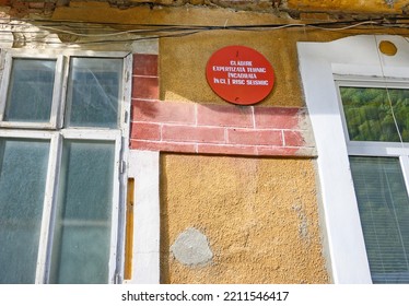 Old Building Technically Expertized In The Category Of Seismic Risk. Red Dot On An Old Building. Romania, Baile Herculane. October, 07, 2022