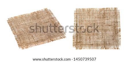 Old burlap fabric napkin closeup. Rough linen jute, sackcloth piece isolated on white background with clipping path. Hessian texture cloth tag with frayed edges. Sack material