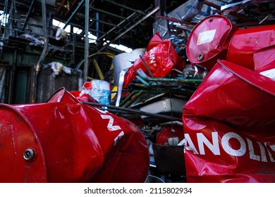 Old Burned Down Building With Red Cans