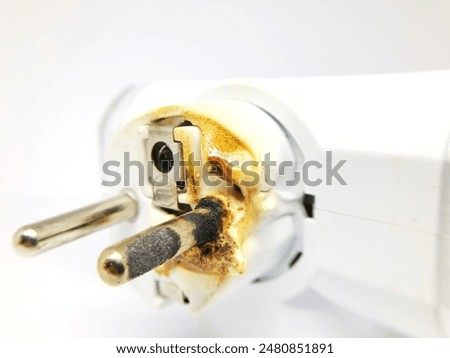 old burnt electrical plug plug isolated white