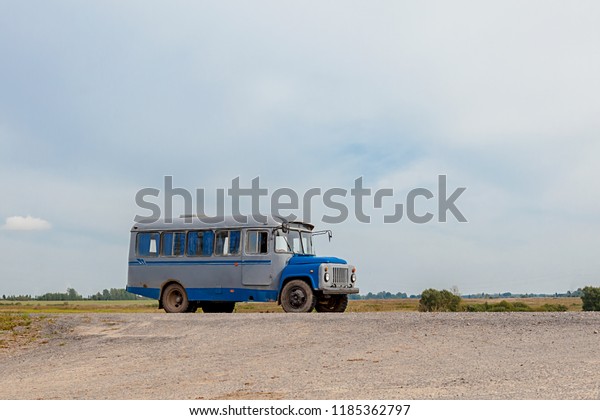 old bus
on a countryside road, 1960 year of
release
