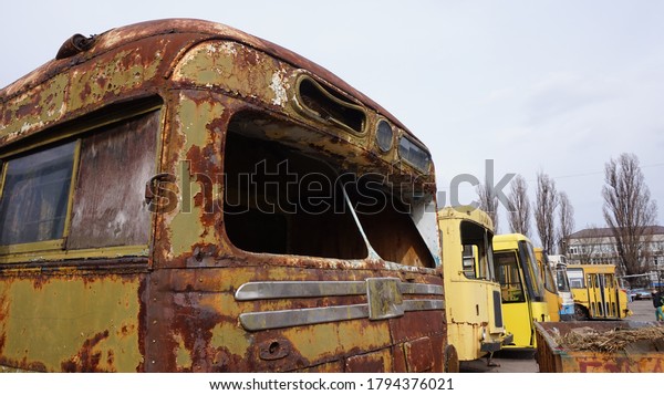 old buses on a deserted\
street