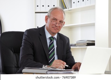 Old Business Man With Laptop