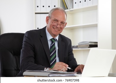 Old Business Man With Laptop