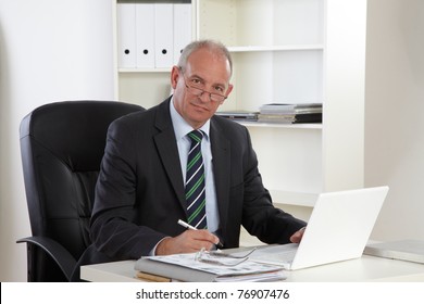 Old Business Man With Laptop