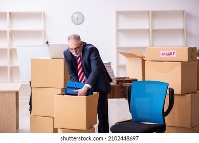 Old Businessman Employee In Relocation Concept