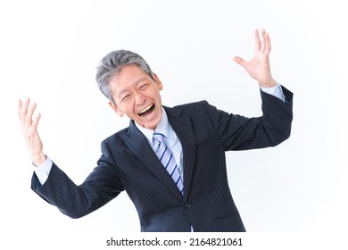 An Old Businessman Laughing Hysterically