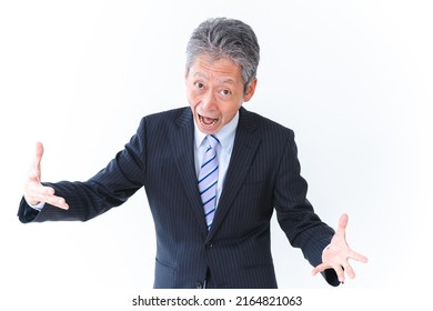 An Old Businessman Laughing Hysterically