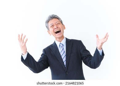 An Old Businessman Laughing Hysterically