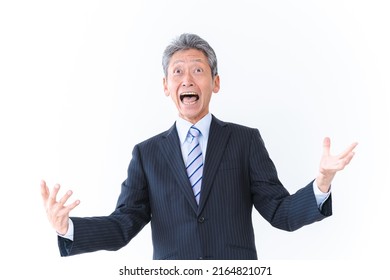 An Old Businessman Laughing Hysterically