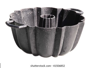 Old Cake Tin Made From Cast Iron - Isolated On White Background