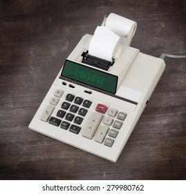 Old Calculator Showing A Text On Display - College