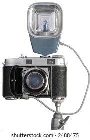 Old Camera With A Flash On A White Background