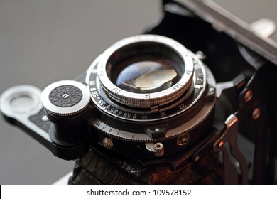 An old camera lens close-up. Shallow DOF.