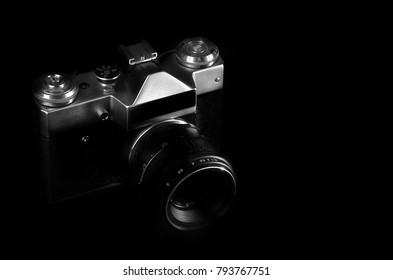old camera on a black background
