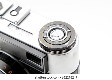 Old camera on white background isolated
