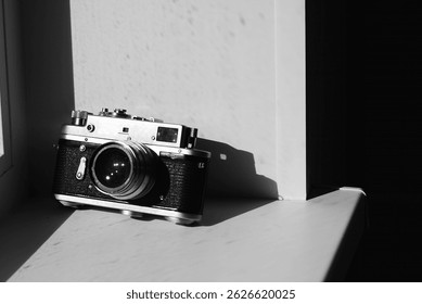 An old camera on the window