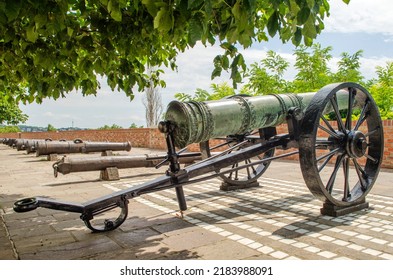 An Old Cannon On A Gun Carriage Exposed On The Street