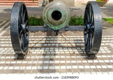 An Old Cannon On A Gun Carriage Exposed On The Street