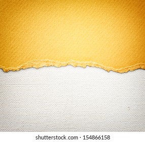old canvas texture background with delicate stripes pattern and orange vintage torn paper 