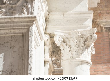 The Old Capital Of The Corinthian Order On A Blurred Background