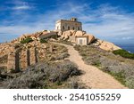 The old Capo Testa lighthouse in Santa Teresa di Gallura, Sardinia, Italy