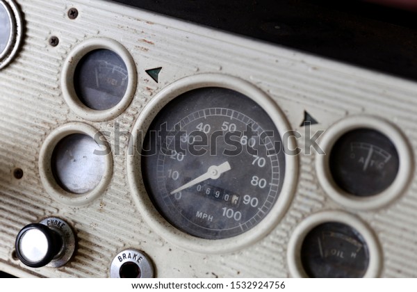 Old car bus dashboard speedometer. Abandoned car\
interior. 