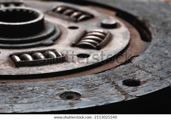 Old car clutch disk close up background.\
Clutch disk replacement.