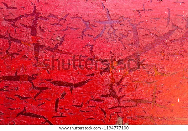 Old car door surface\
red paint cracked