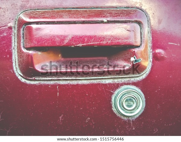 Old car doors, paint\
began to peel off. 
