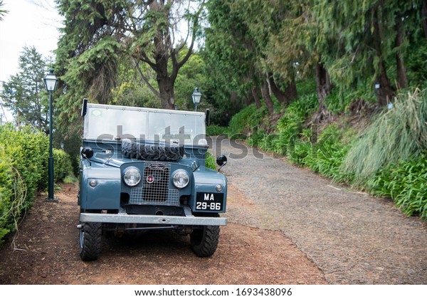a old car in\
the Gardens on the reopening of the Emperior Gardens at Monte near\
the city centre of Funchal on the Island Madeira of Portugal.  \
Portugal, Madeira, April 2018