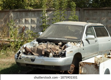 Old Car With The Hood Removed For Scrap. Car Engine Repair.