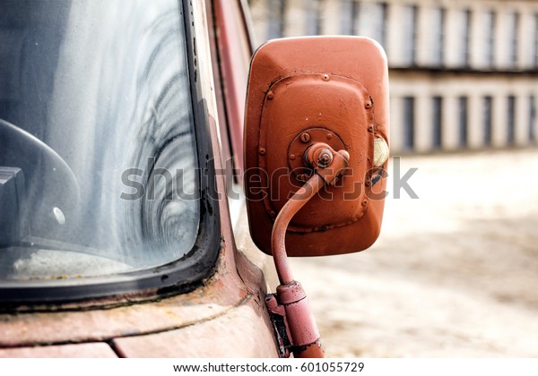 Old car mirror. Grunge
texture