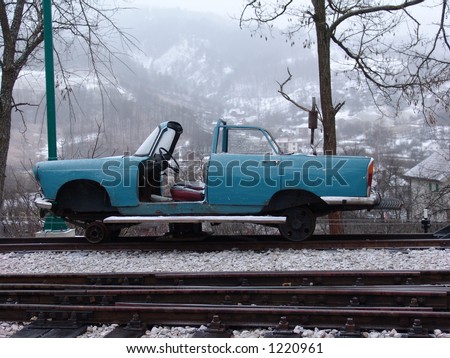 Old car on the rail in witner