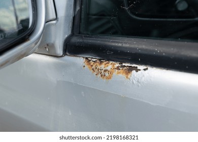 Old Car Paint Cracked Silver Color Crack With Steel Rusty Inside.