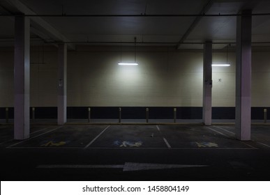 Old car park at a shopping centre in the suburbs of Melbourne, Australia.  These spaces are reserved for Mums and Dads.
