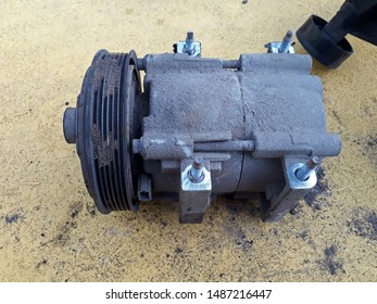 Old Car Parts. Car Air Conditioning Compressor.