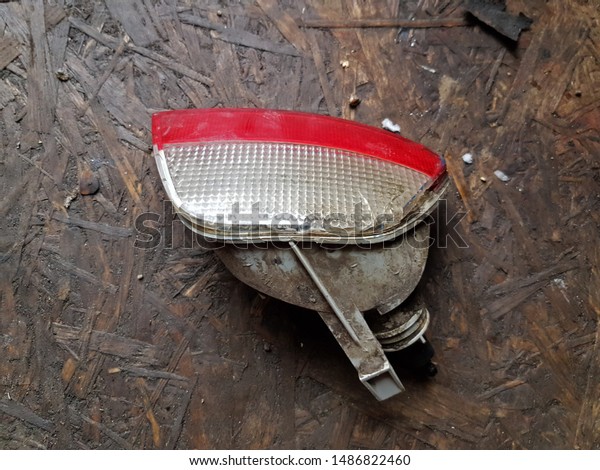 Old car parts, tail\
light.