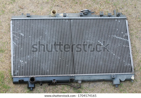 Old car radiators, cooling radiators, engine blur\
on the grass