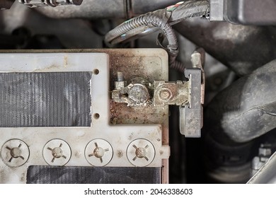 Old Car Starter Battery Inside The Engine Bay Viewed From Above Top Down, Negative Terminal Connection Closeup