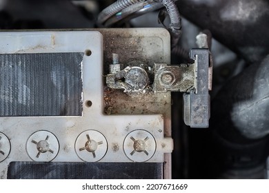 Old Car Starter Battery Inside The Engine Bay Viewed From Above Top Down, Negative Terminal Connection Closeup